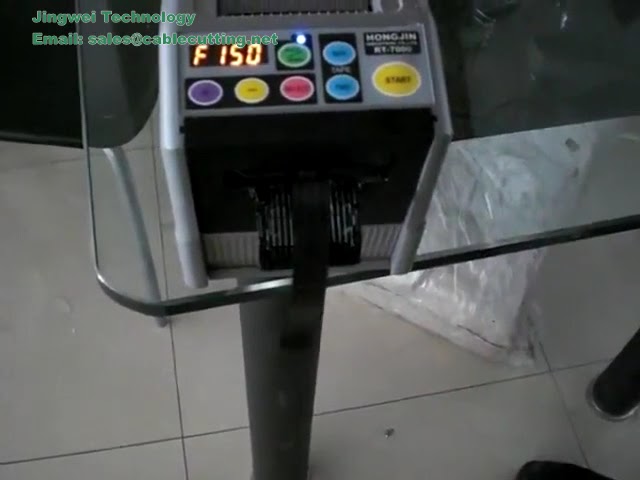 HONGJIN RT 7000 Automata Szalagadagoló – Precíz, Gyors Csomagolás Gyári Automatizáláshoz